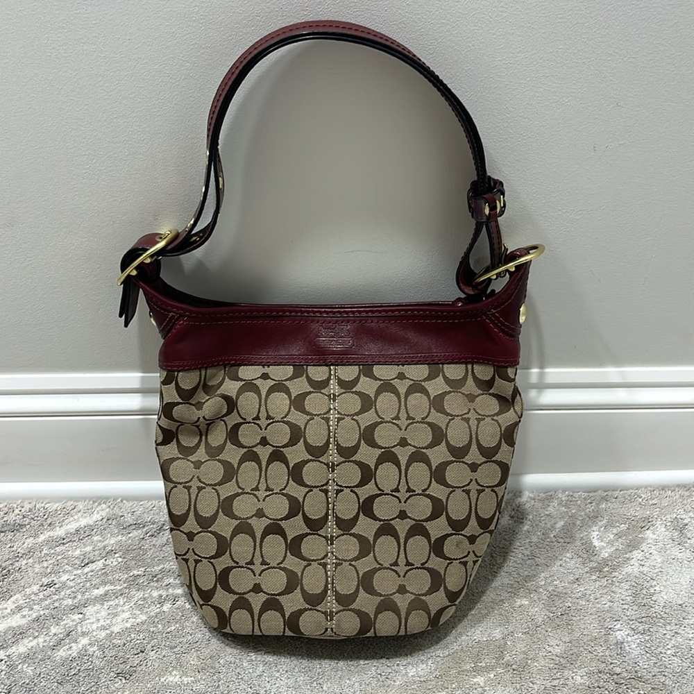 Coach Bleeker bucket bag. Maroon leather with Signature C fabric. Classic Coach